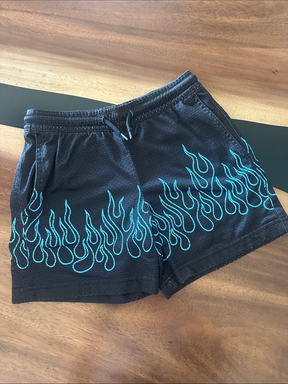 Black Mesh Flame Athletic Shorts with Teal Flame Design